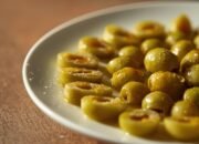 Lucid_Origin_a_highly_detailed_cinematic_photograph_of_a_delic_0